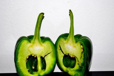 Close-up of green bell peppers on table