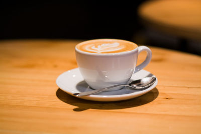 Close-up of coffee cup on table