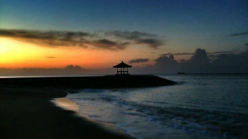 Scenic view of sea at sunset