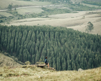 High angle view of man walking on field