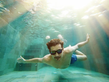 Man swimming in sea