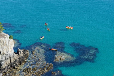 High angle view of rocks in sea