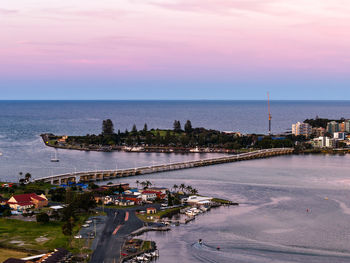 High angle view of sea against sky during sunset