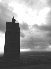 Building against cloudy sky