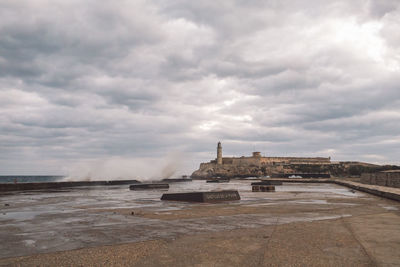 View of historical building against cloudy sky