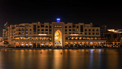 Illuminated buildings at night