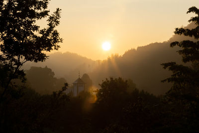 Scenic view of mountains against sky during sunset