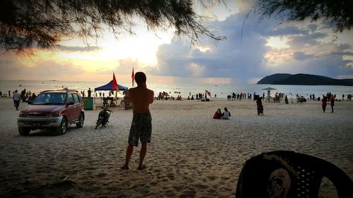 Scenic view of beach at sunset