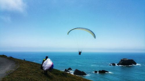 Paragliding off the ocean cliffs