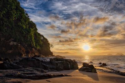 Scenic view of sea against sky during sunset