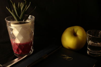 Close-up of cocktail in glass on table