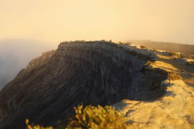Scenic view of mountains against sky during sunset