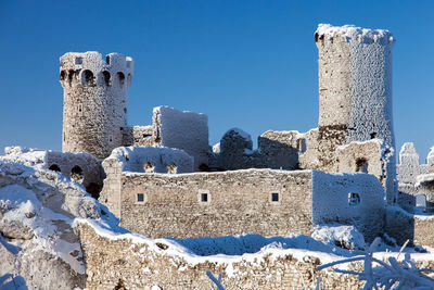 Old building against blue sky