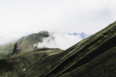 Scenic view of majestic mountains against sky