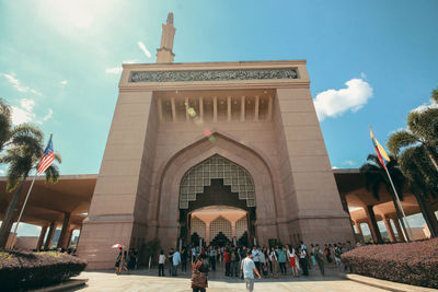 Group of people in front of historical building