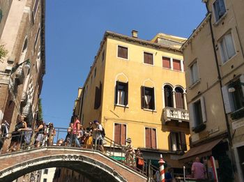 Low angle view of buildings against clear sky