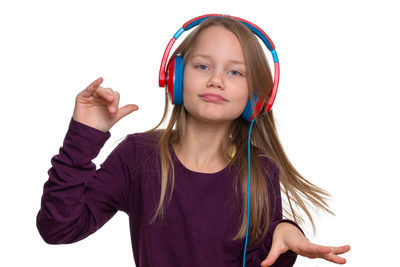 Portrait of a smiling girl over white background