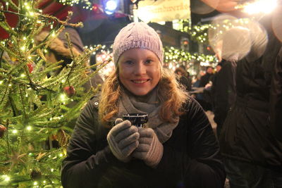 Portrait of woman at christmas market