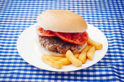 Close-up of burger in plate on table