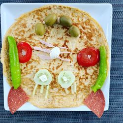 High angle view of breakfast served on table