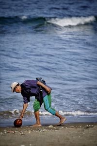 Full length of boy on beach