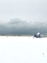 Scenic view of snow field against sky