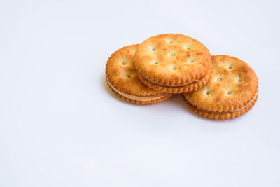 Close-up of cookies against white background