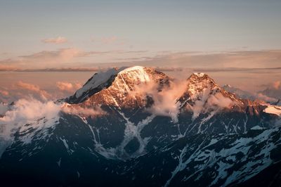 Scenic view of mountain against sky during sunset