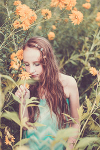 Portrait of young woman outdoors