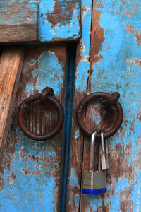 Close-up of padlock on door