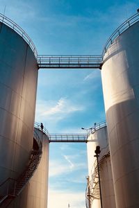 Low angle view of factory against sky