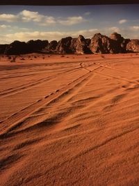 Scenic view of desert against sky