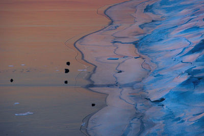 Aerial view of sand dunes against sky