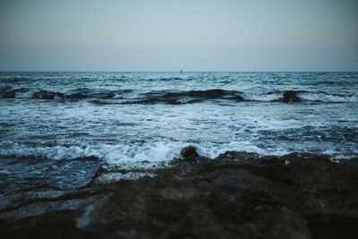 Scenic view of sea against clear sky