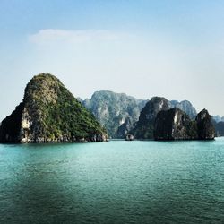 Scenic view of bay against clear sky