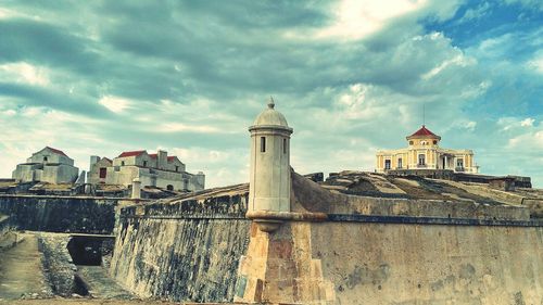 View of historical building against cloudy sky