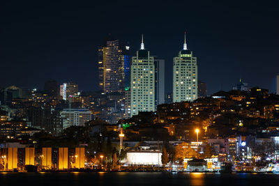Illuminated buildings in istanbul at night from asia to europe