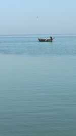 A sailor boating in huge river