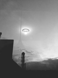 Low angle view of street light against sky