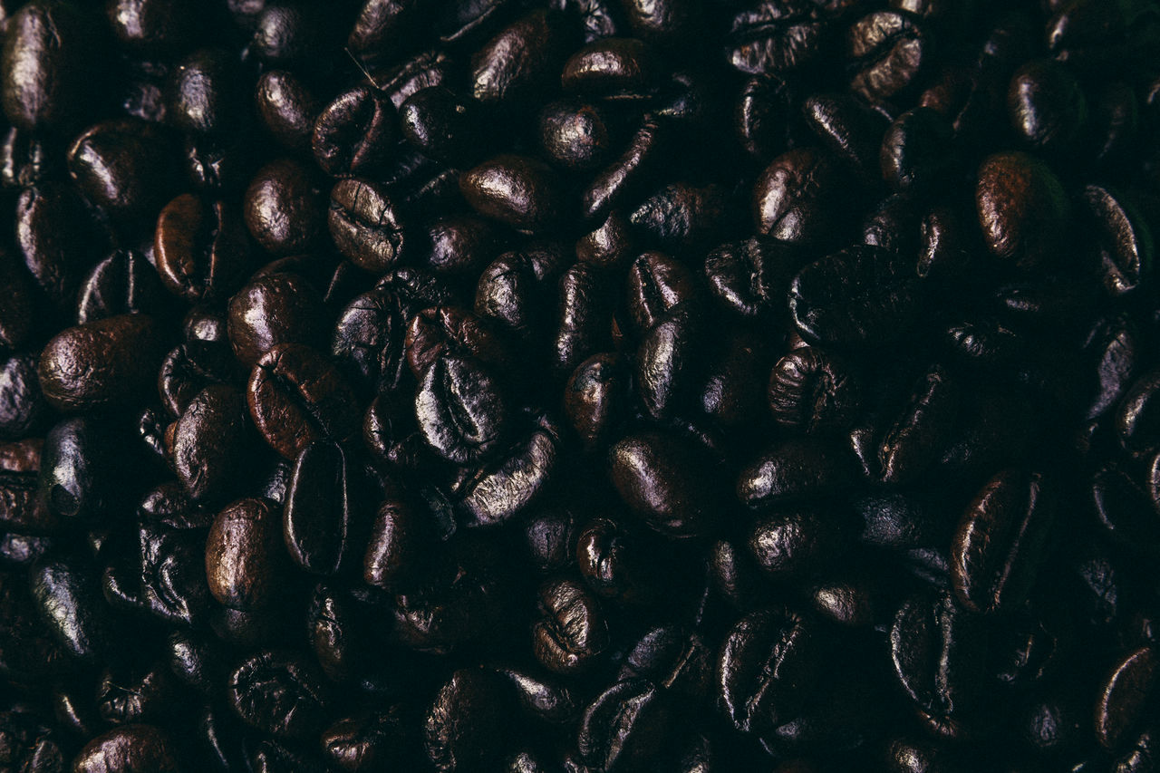 HIGH ANGLE VIEW OF COFFEE BEANS IN BACKGROUND