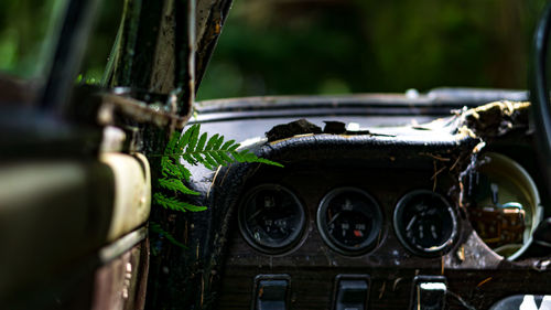 Close-up of abandoned car