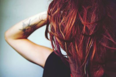 Close-up portrait of woman with hair