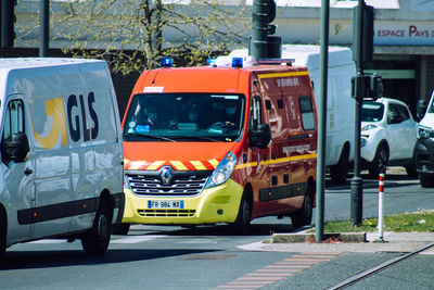 Vehicles on road in city