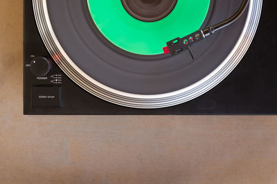 Directly above shot of record playing on turntable
