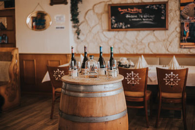 Close-up of wine glasses on table