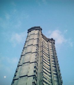 Low angle view of building against blue sky