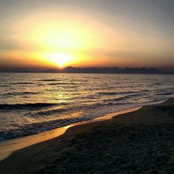 Scenic view of sea at sunset