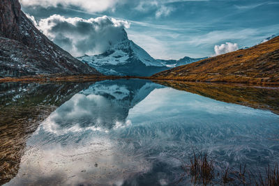 Panoramic view of matterhorn peak, switzerland. matterhorn reflection in the riffelsee.