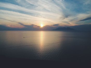 Scenic view of sea at sunset