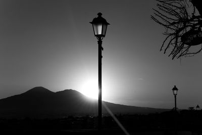 Street light against sky